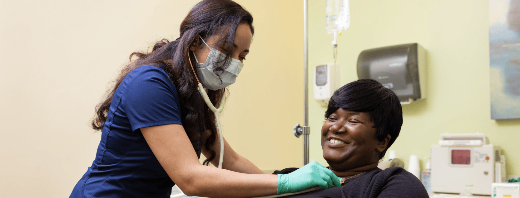 dental hygienist checking out patient