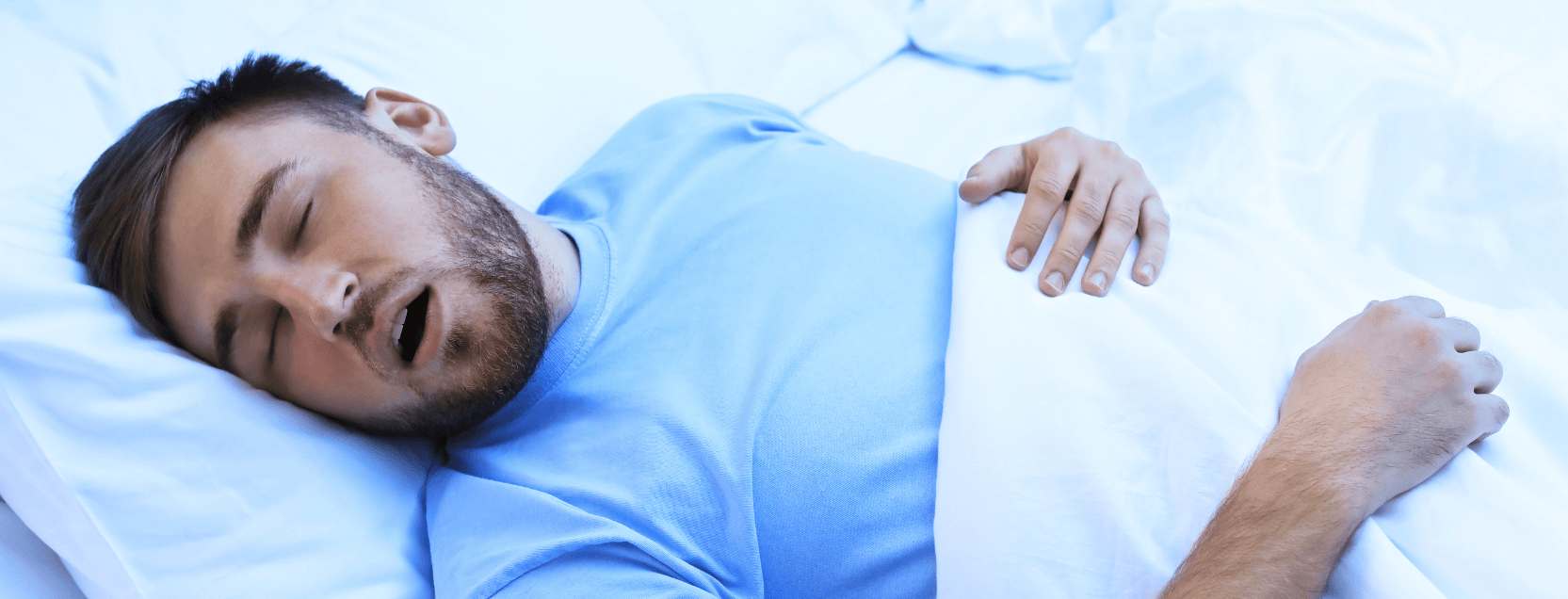 man sleeping with his mouth open